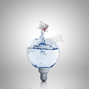 概念形象，灯泡装满清水。带水的灯泡