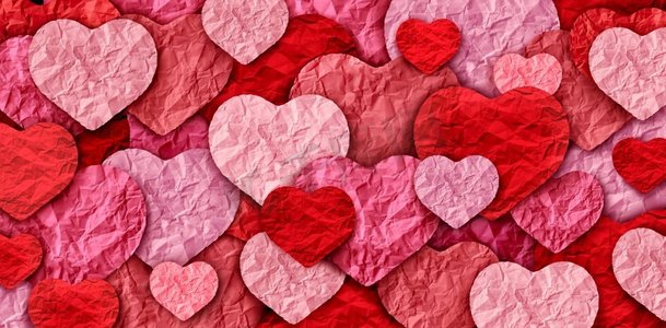 情人节抽象的背景和粉红色的心形图案用剪纸做成的浪漫问候。