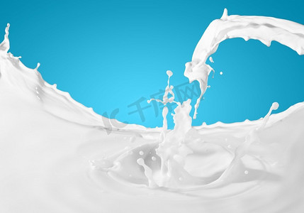牛奶飞溅的画面。彩色背景下的牛奶溅起的图像