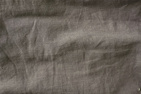 灰色织物、亚麻纹理、波浪形抽象背景