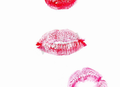 嘴唇接吻摄影照片_白色背景上女性的接吻口红