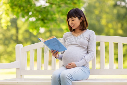 母亲读书摄影照片_怀孕，读书，阅读，公园