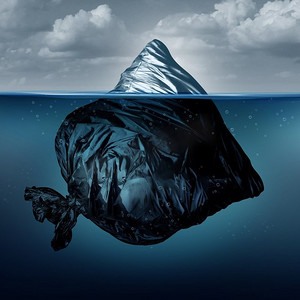 u冰山图摄影照片_垃圾冰山作为垃圾袋冰山在海洋或污染的海作为全球污染的环境象征在3D例证样式。