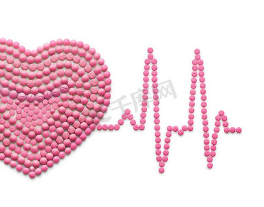 人曲线摄影照片_由药品和药丸制成的创意医学和保健概念，隔离在白色上。心电信号，一颗有心跳线的人的心脏。