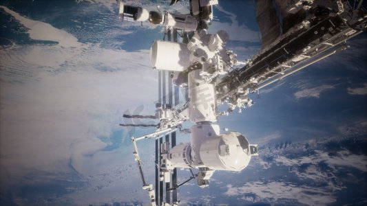 宇宙星球飞船摄影照片_地球和外层空间站
