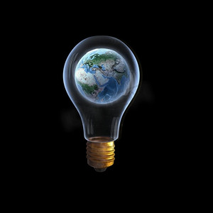 全球变暖。玻璃灯泡，里面有地球星球。这张图片的要素由美国宇航局提供