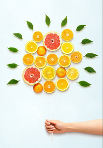 流感饮食摄影照片_健康的饮食理念和创意静物的新鲜柑橘花束。