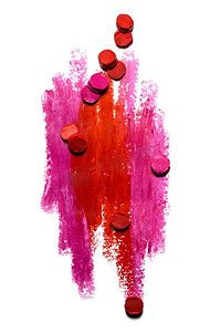 一张抽象的红色和粉色笔触的创意照片，白色上孤立着几片口红。