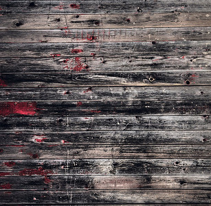 木质木材板材的复古背景。黑色、红色、古老的乡村背景