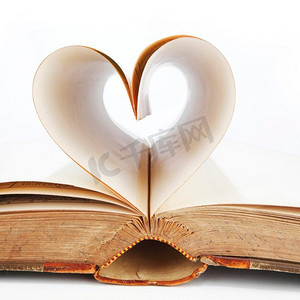 书打开形状摄影照片_用书页做的心，爱情阅读，情人节概念