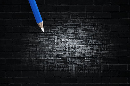 商业关键字。用铅笔在墙上写下的商业概念词