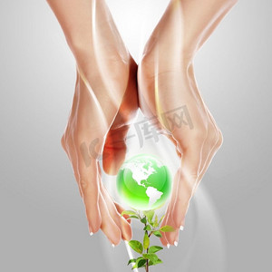 手和地球。环境保护的象征