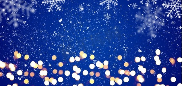 蓝色喜庆的圣诞背景。蓝色节日圣诞或新年背景，配有闪闪发光的金色小玩意儿