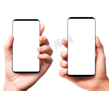 边框手机摄影照片_现代无边框智能手机在手。无边框智能手机，男性和女性手中的空白屏幕在白色背景下隔离