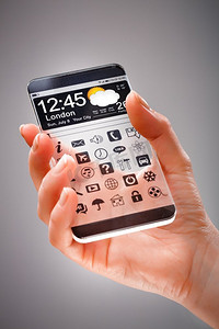logo透明摄影照片_未来派智能手机（平板手机）与透明显示在人的手中.概念实际未来创新的想法和最好的技术人类。