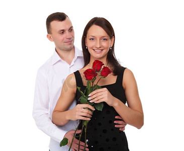 一位有爱心的男人为他的女人捧着一朵红玫瑰