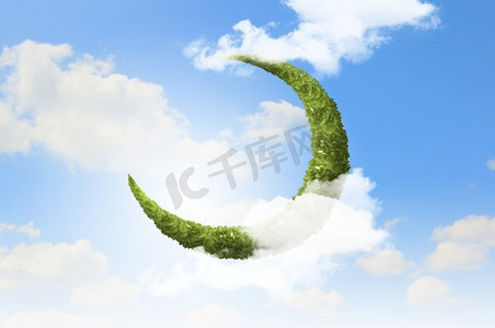 绿叶空气摄影照片_绿色的月亮。绿叶月的概念意象