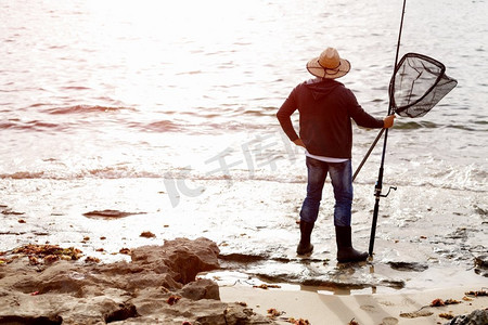 人与自然图片摄影照片_渔夫的照片图片渔民捕鱼与杆