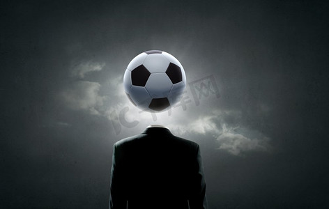 风扇卡通摄影照片_橄榄球脸无法辨认的人与足球而不是头