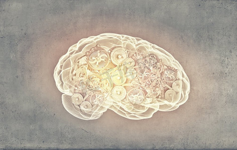 人脑思维摄影照片_人类的大脑人脑的齿轮和嵌齿轮水泥背景