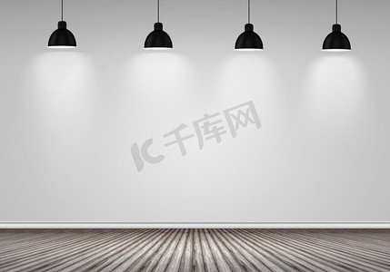 空白的墙。空房间与空白的墙壁和灯在天花板上