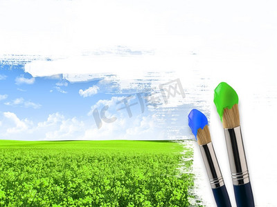 用刷子把风景涂上蓝天绿草。
