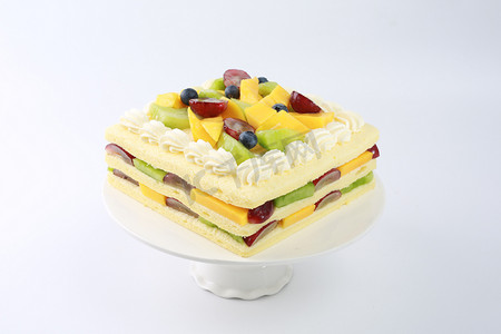精致美食摄影照片_蛋糕糕点精致甜品蛋糕店烘焙生日多层鲜果夹心芒果