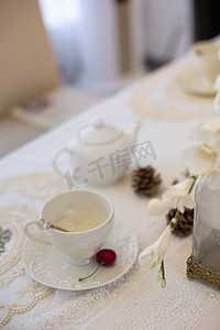 唯美玫瑰摄影照片_咖啡下午茶欧式装修蜡烛餐桌假花插花烛台鲜花