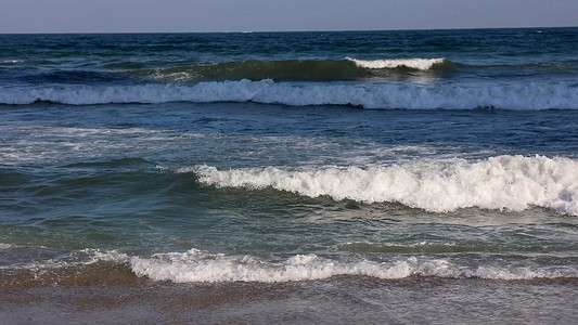 海水海浪蓝天双月湾海景