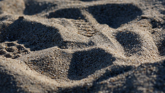 阳光照射的沙滩沙子