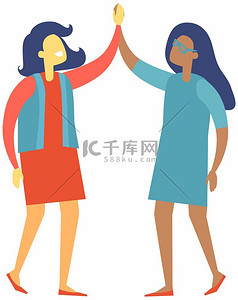 两个快乐的女商人握手表示同意。