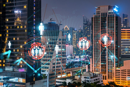全景城市背景图片_在曼谷的夜景全景城市视野中，闪耀着社交媒体的图标。在人与企业之间建立联系和建立新联系的概念。加倍暴露.