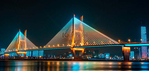 桥夜景背景图片_城市夜景蓝色简约武汉城市建筑背景