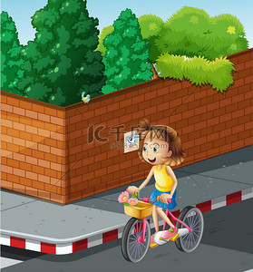 小女孩骑自行车的道路上