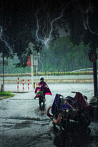 大雨天气背景图片_暴雨摄影图绿色简洁创意背景