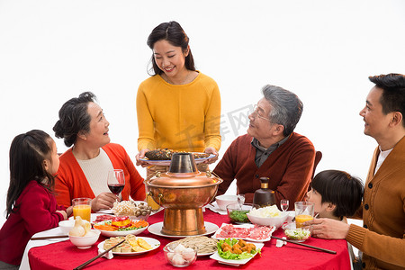 新年全家福摄影照片_幸福家庭过年吃团圆饭