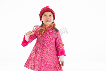 粉色可爱元素摄影照片_欢乐的小女孩吃糖葫芦