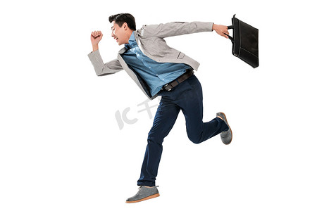 奔跑的人背景摄影照片_拿手提包奔跑的青年商务男士
