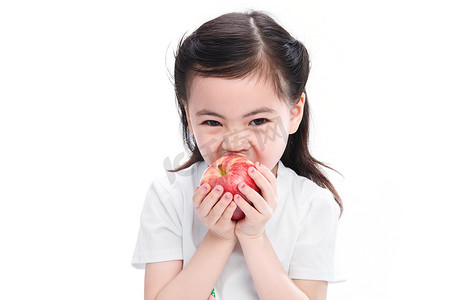 影楼可爱文字摄影照片_可爱的小女孩吃苹果