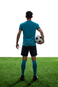 足球运动场图片摄影照片_拿着足球的运动员背影