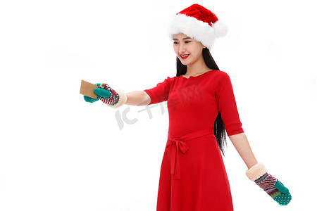 圣诞卡片图片摄影照片_拿着银行卡的年轻女人