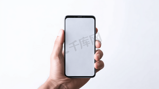 手机壳图案设计摄影照片_正上方视角特写手操作白屏手机
