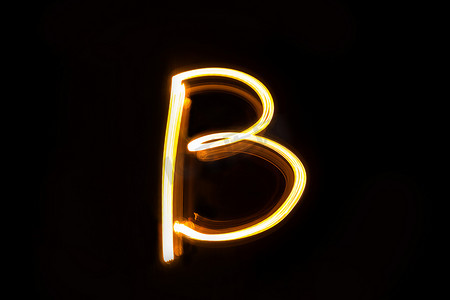 黑色创意B摄影照片_烟花字母