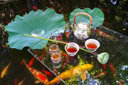 小溪莲蓬摄影照片_池塘边茶具