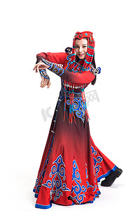 跳舞的蒙古族摄影照片_穿着蒙古族服饰的女人