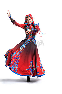 少数民族背景摄影照片_穿着蒙古族服饰的女人