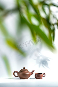 竹叶影子摄影照片_竹叶下的茶壶