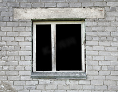 窗户边框摄影照片_旧建筑的黑暗窗户