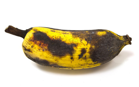 溃烂摄影照片_孤立在白色背景上的腐烂香蕉
