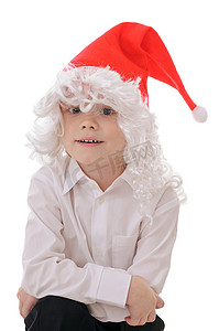 圣诞老人帽子摄影照片_圣诞老人帽子的孩子
